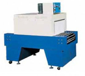 Shrink Packing Machine equipped with an adjustable speed conveyor and 2 temperature controllers for upper and lower heaters.